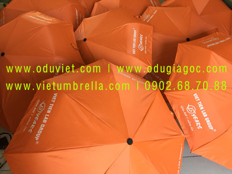 xưởng sản xuất ô dù cầm tay in logo quảng cáo